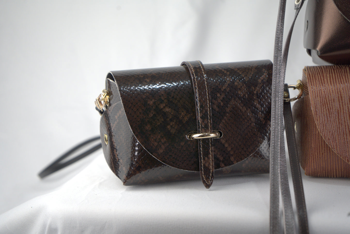 Mini bag con pellami pregiati