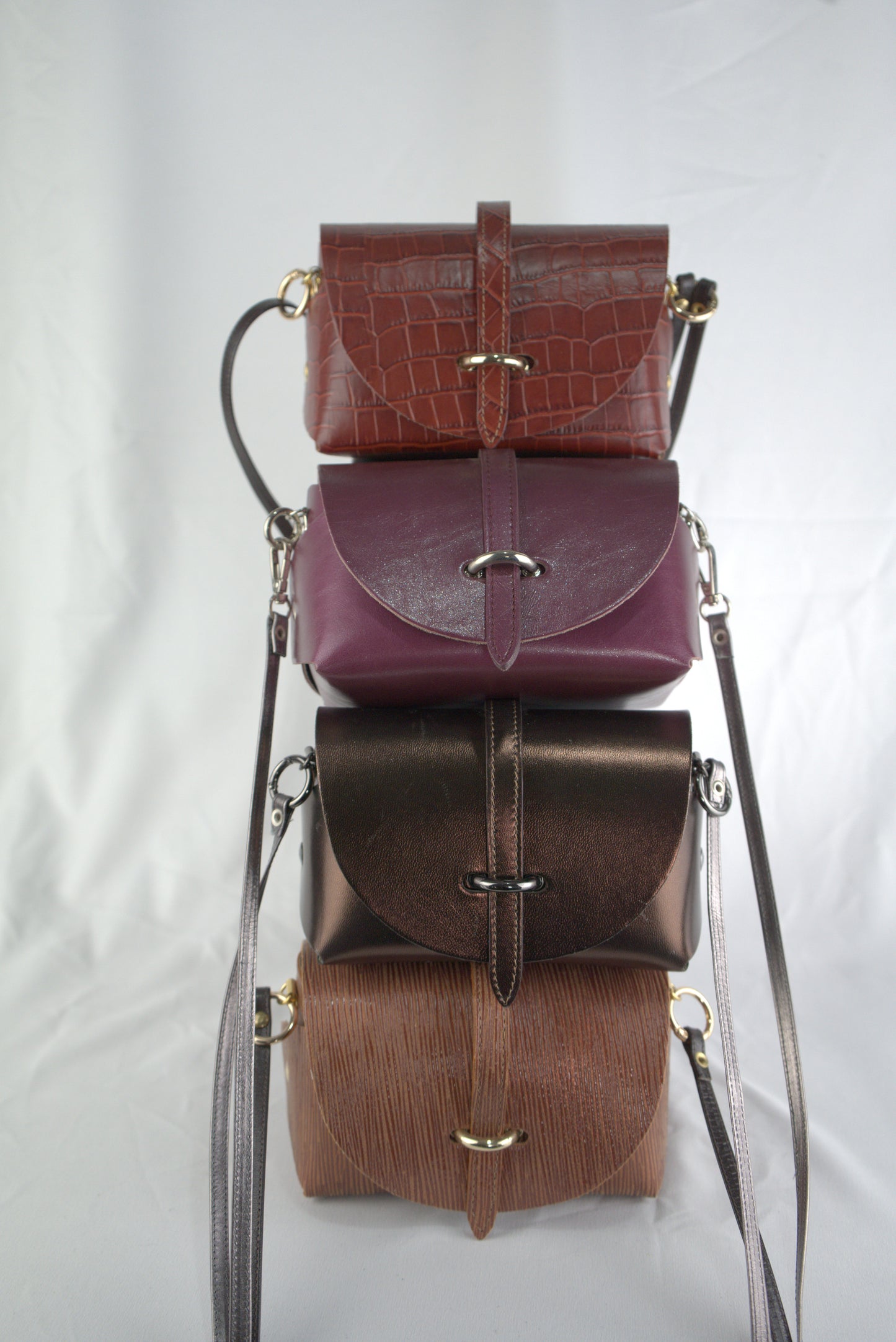 Mini bag con pellami pregiati