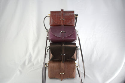 Mini bag con pellami pregiati