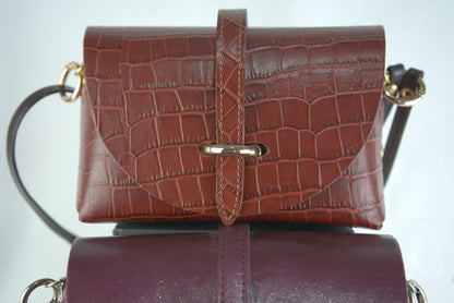 Mini bag con pellami pregiati