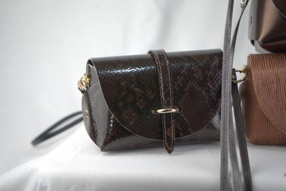 Mini bag con pellami pregiati