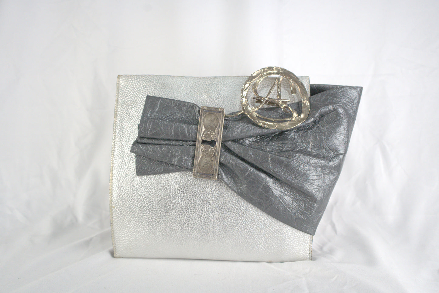 Borsa a polso per aperitivo pelle stampata